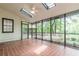 Charming sunroom with tile flooring, skylights, and screened windows providing a view of the outdoors at 2911 Bentwood Dr, Marietta, GA 30062