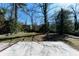 The well-maintained backyard offers an ample green space, ideal for outdoor activities or relaxation at 3512 Fairlane Nw Dr, Atlanta, GA 30331