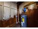 A utility room shows a water heater, exposed ductwork, and unfinished walls in a basement utility area at 3512 Fairlane Nw Dr, Atlanta, GA 30331