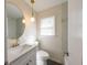 Bathroom featuring quartz vanity and modern fixtures at 3512 Fairlane Nw Dr, Atlanta, GA 30331