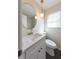 Bathroom featuring quartz vanity and modern fixtures at 3512 Fairlane Nw Dr, Atlanta, GA 30331