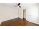 Bedroom featuring hardwood floors, ceiling fan, and closet at 3512 Fairlane Nw Dr, Atlanta, GA 30331