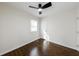 Bedroom with hardwood floors, ceiling fan and closet at 3512 Fairlane Nw Dr, Atlanta, GA 30331