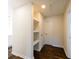 Hallway area featuring shelves and doors at 3512 Fairlane Nw Dr, Atlanta, GA 30331