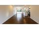 Open living space showcasing hardwood floors, modern lighting, and a stylish kitchen at 3512 Fairlane Nw Dr, Atlanta, GA 30331
