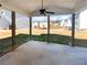 Spacious backyard features a covered patio, lush green grass, and plenty of room for outdoor entertainment at 362 Reserve Overlook, Canton, GA 30115