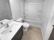 Bathroom featuring a shower-tub combo and a single sink vanity at 362 Reserve Overlook, Canton, GA 30115