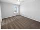 Bedroom with plush neutral carpet, a ceiling fan, and a large window at 362 Reserve Overlook, Canton, GA 30115