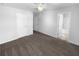 Spacious bedroom with neutral carpet, adjacent bathroom, and ceiling fan at 362 Reserve Overlook, Canton, GA 30115