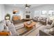Bright living room features lots of natural light and a cozy fireplace that adds warmth and character at 362 Reserve Overlook, Canton, GA 30115
