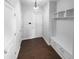 Functional mudroom featuring built-in storage, bench, and convenient access to the home at 362 Reserve Overlook, Canton, GA 30115