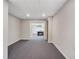 Large basement area with carpet and walk through to billiards room at 540 Clubfield Drive, Roswell, GA 30075