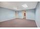 Carpeted basement with light blue walls at 540 Clubfield Drive, Roswell, GA 30075