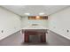 Basement with billiard table with cover and cues at 540 Clubfield Drive, Roswell, GA 30075