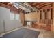 Unfinished basement featuring exposed ductwork and a utility sink at 540 Clubfield Drive, Roswell, GA 30075