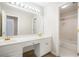 Bright bathroom with double sinks, vanity and shower over tub at 540 Clubfield Drive, Roswell, GA 30075
