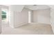 Spacious bedroom with neutral carpet and a window offering natural light at 540 Clubfield Drive, Roswell, GA 30075