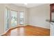 Breakfast nook with hardwood floors and large windows offering abundant light at 540 Clubfield Drive, Roswell, GA 30075