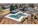Aerial view of community pool with lounge area; covered for the season at 540 Clubfield Drive, Roswell, GA 30075