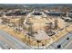 Aerial shot of a city center highlighting the town square, community buildings and green spaces at 4000 Bethelview Ln, Suwanee, GA 30024