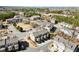 Aerial shot of neighborhood featuring townhomes with manicured landscaping at 4000 Bethelview Ln, Suwanee, GA 30024