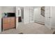 Bonus Room displaying its open layout with access to a bathroom and a staircase at 4000 Bethelview Ln, Suwanee, GA 30024