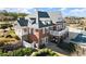 Beautiful clubhouse with white balcony and covered patio overlooking meticulously maintained grounds at 4000 Bethelview Ln, Suwanee, GA 30024