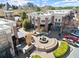 A charming outdoor courtyard with a water feature, surrounded by upscale shops and restaurants at 4000 Bethelview Ln, Suwanee, GA 30024