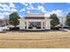 A classic gazebo with a copper roof and white pillars, surrounded by manicured landscaping at 4000 Bethelview Ln, Suwanee, GA 30024