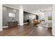 Spacious living room with hardwood floors, stylish decor, and ample natural light at 4000 Bethelview Ln, Suwanee, GA 30024