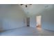 Bedroom features a vaulted ceiling, fan, and an ensuite bathroom at 71 Malcom Rd, Covington, GA 30014