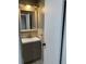 This bathroom features a new vanity with a silver faucet and natural-colored tiling at 330 9Th Ne St # 11, Atlanta, GA 30309