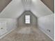 A bright finished attic with a window at 1541 Towne Park Ct, Lawrenceville, GA 30044
