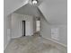A bright finished attic with a closet and window at 1541 Towne Park Ct, Lawrenceville, GA 30044