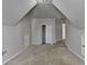 A bright finished attic with a closet and window at 1541 Towne Park Ct, Lawrenceville, GA 30044