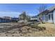 View of the backyard with grass and a trampoline at 1541 Towne Park Ct, Lawrenceville, GA 30044
