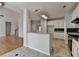 Modern kitchen with granite counters, tile backsplash, white cabinetry and stainless steel appliances at 1541 Towne Park Ct, Lawrenceville, GA 30044