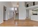 Open living room with hardwood floors, two-story ceiling and a staircase leading up to the second floor at 1541 Towne Park Ct, Lawrenceville, GA 30044