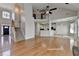 This open living room features hardwood floors, a vaulted ceiling, and a staircase at 1541 Towne Park Ct, Lawrenceville, GA 30044