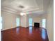 Spacious living room with coffered ceiling, fireplace, and large windows at 2513 Galloways Farm Drive Nw, Acworth, GA 30101