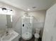 Bathroom featuring stylish vanity, toilet, and glass shower at 444 Sargent Se Dr, Atlanta, GA 30315