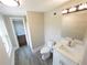 Bathroom featuring tile shower and modern vanity with lighting at 444 Sargent Se Dr, Atlanta, GA 30315