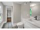 Clean bathroom featuring a modern vanity, faucet, and toilet creating a functional and aesthetically pleasing space at 444 Sargent Se Dr, Atlanta, GA 30315
