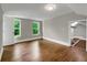 Comfortable bedroom with hardwood flooring, natural light, and closet at 444 Sargent Se Dr, Atlanta, GA 30315