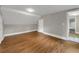 Spacious bedroom featuring hardwood floors and neutral paint, offering a blank canvas for personalization at 444 Sargent Se Dr, Atlanta, GA 30315