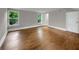 Spacious bedroom featuring hardwood floors and natural light, creating a peaceful and relaxing retreat at 444 Sargent Se Dr, Atlanta, GA 30315