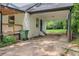 The carport features a concrete floor and brick column, providing covered parking at 444 Sargent Se Dr, Atlanta, GA 30315