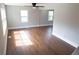 Bright living room with hardwood floors, neutral walls, and ample natural light at 444 Sargent Se Dr, Atlanta, GA 30315