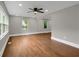 Bright and open living room featuring hardwood floors and recessed lighting at 444 Sargent Se Dr, Atlanta, GA 30315