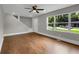 Bright living room featuring hardwood floors and large windows with natural light, offering a welcoming space at 444 Sargent Se Dr, Atlanta, GA 30315